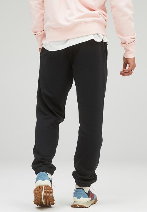 New Balance  - NB Essentials uni-ssentials jogger - black