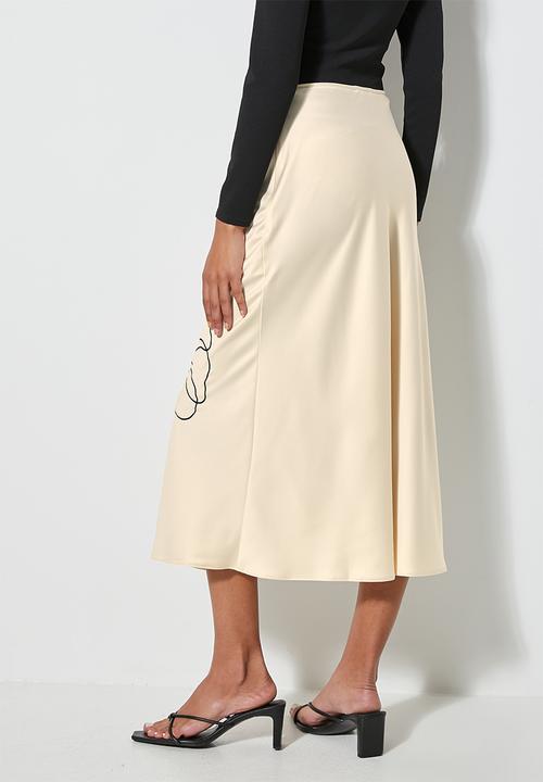 VELVET - Satin skirt with large placement print - sand