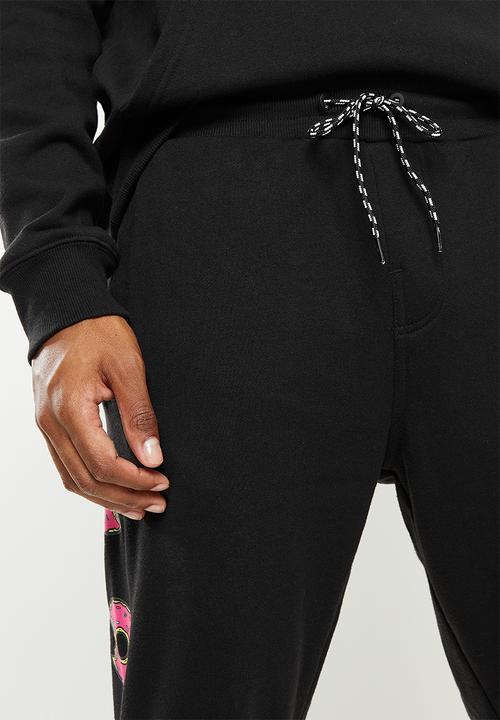 Billabong  - The Simpsons™ Donut Fleece Pants - Black
