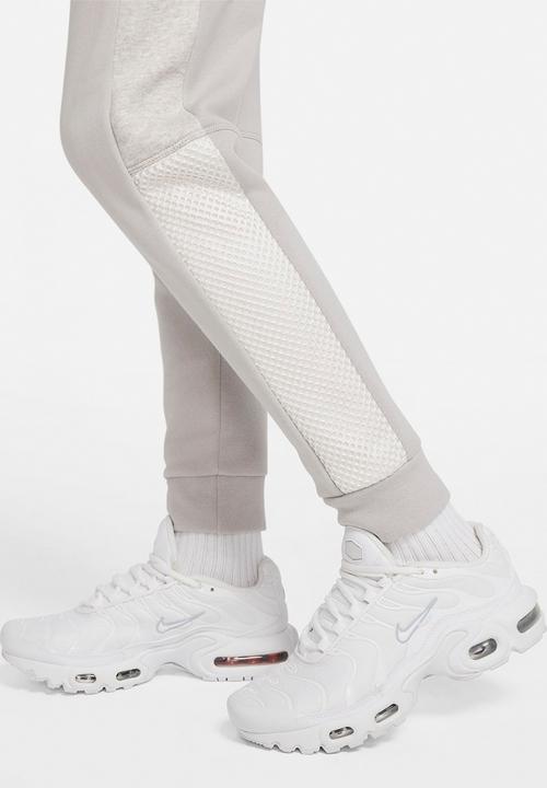 Nike - B nsw nke air pant - lt iron ore/htr/phantom/black