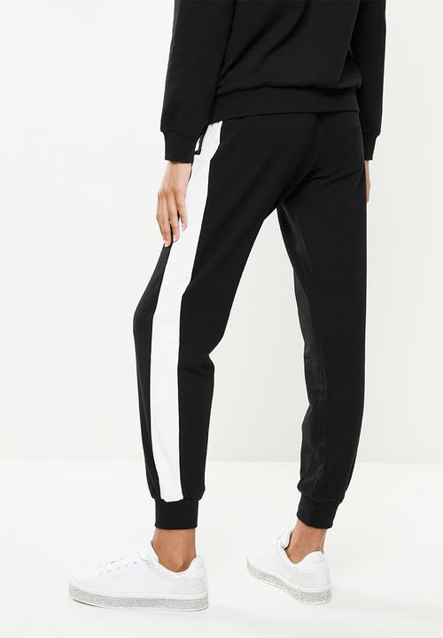 SISSY BOY - Trackpants with bling logo - black & white
