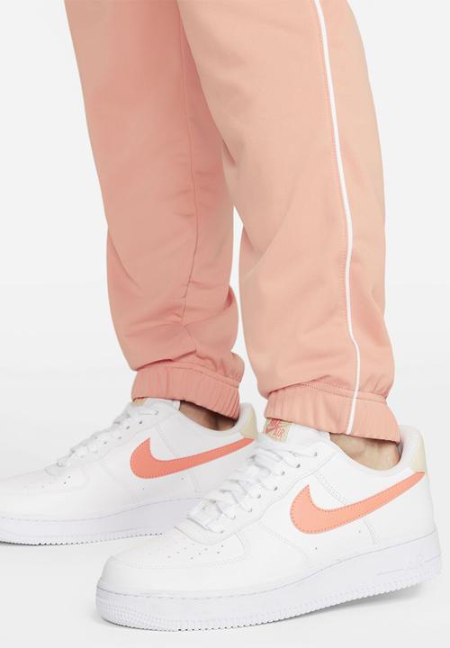 Nike - W nsw essntl pqe trk suit - lt madder root