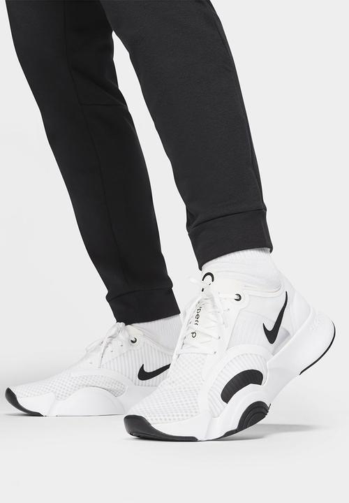 Nike - Dri-FIT Men's Tapered Training Trousers - Black & White