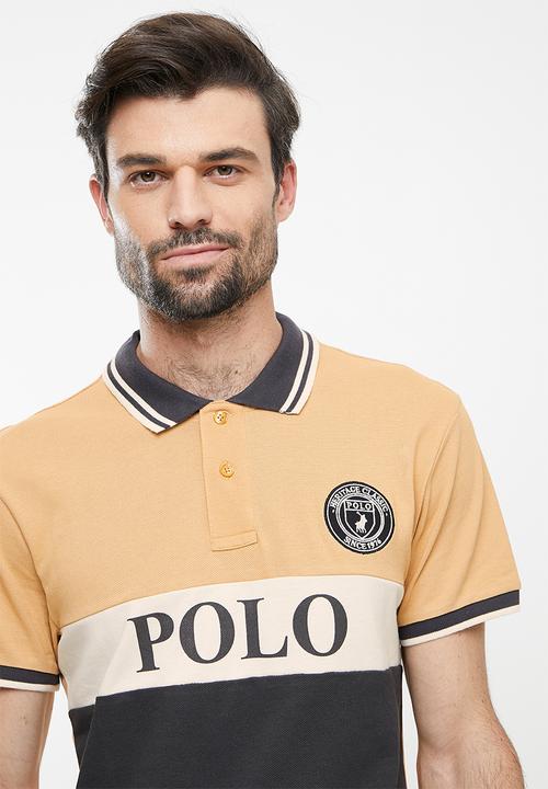 POLO - Mns colourblock short sleeve golfer - rust