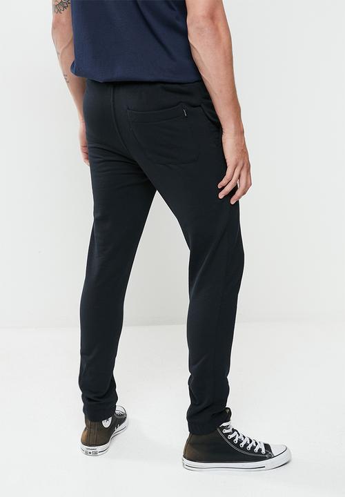 Rip Curl - Search icon trackpant - black