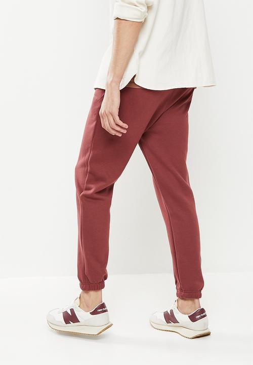 Jonathan D - Men's branded sweat pants - red