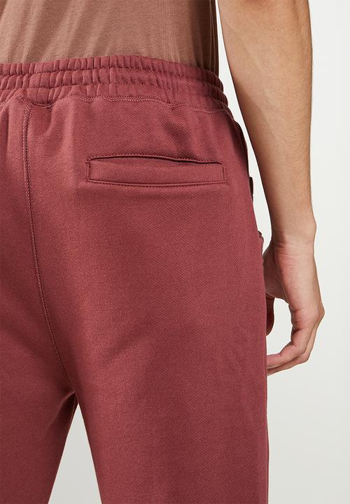 Jonathan D - Men's branded sweat pants - red