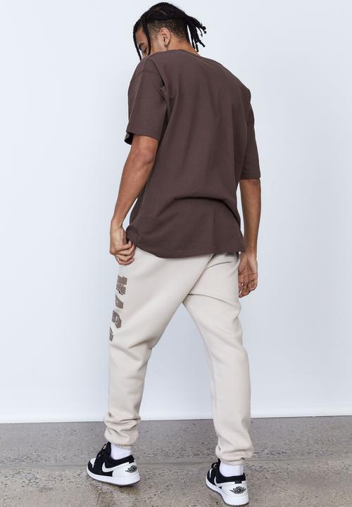 Factorie - Nasa relaxed trackpant - lcn nas ivory nasa