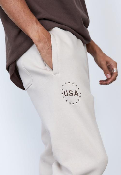 Factorie - Nasa relaxed trackpant - lcn nas ivory nasa