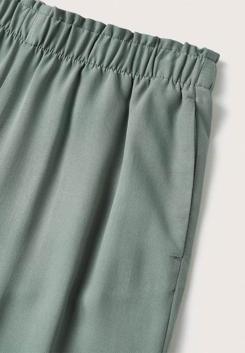 MANGO - Trousers fluido - beige/khaki