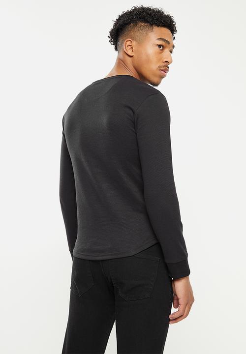 S.P.C.C - Lamont long sleeve scooped hem - black