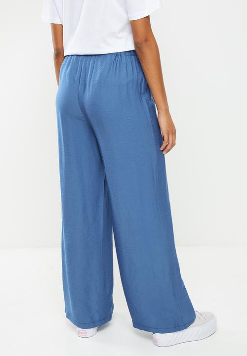 Koton - Medium rise flare trousers - blue