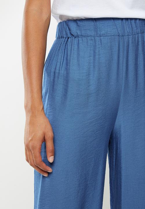 Koton - Medium rise flare trousers - blue