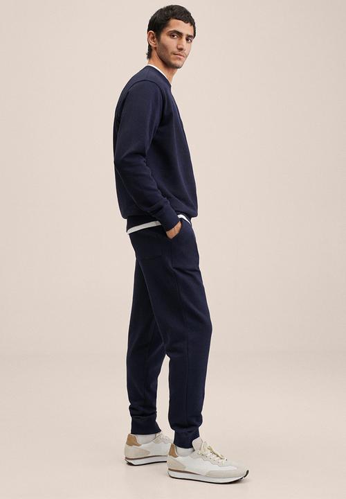 MANGO - Noel cotton jogger-style trousers - navy