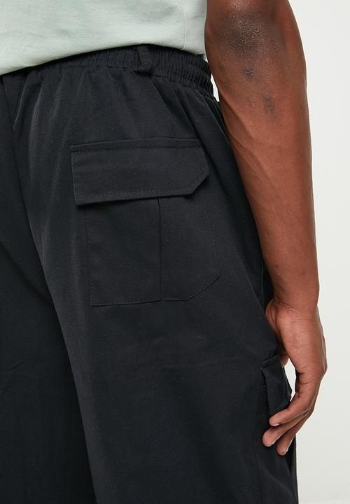 basicthread - Slim fit cuffed chino - black