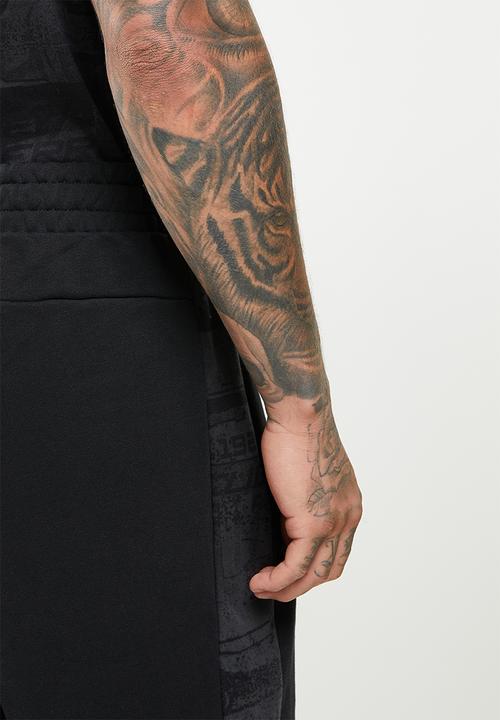 PUMA - Ferrari race aop sweat pants - puma black