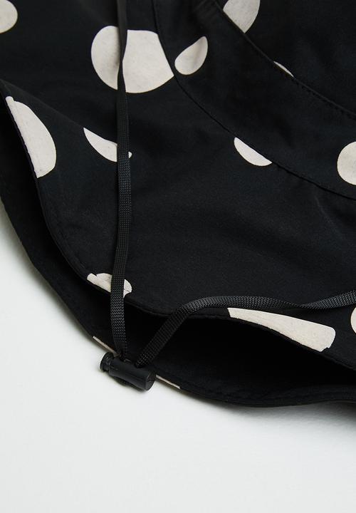 Superbalist - Reversible polka dot bucket hat - black & neutral