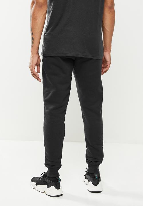 Under Armour - Ua rival flc graphic jogger - black