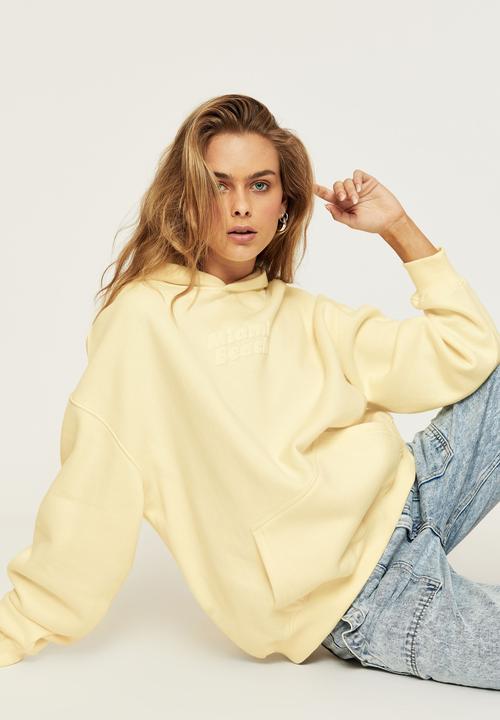 Supré  - Paige oversized printed hoodie - lemon chiffon miami beach