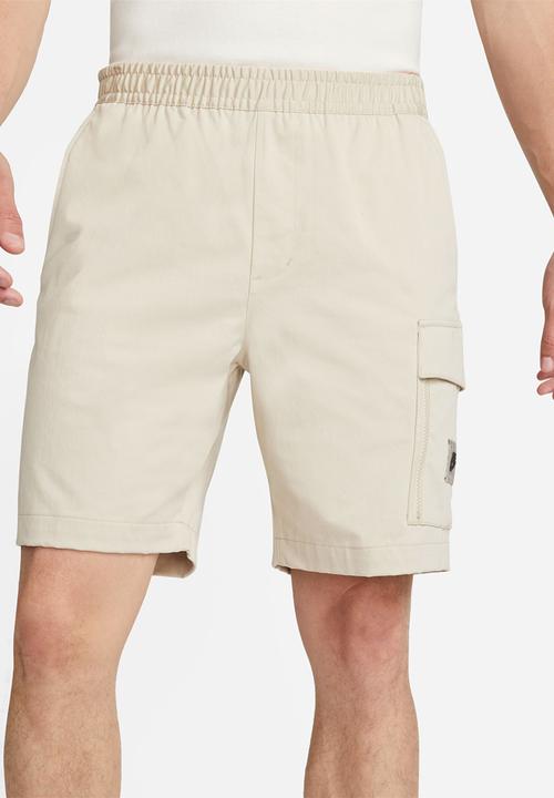 Nike - NSW spu woven short - rattan & safety orange