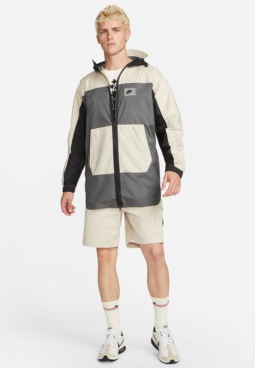 Nike - NSW spu woven short - rattan & safety orange