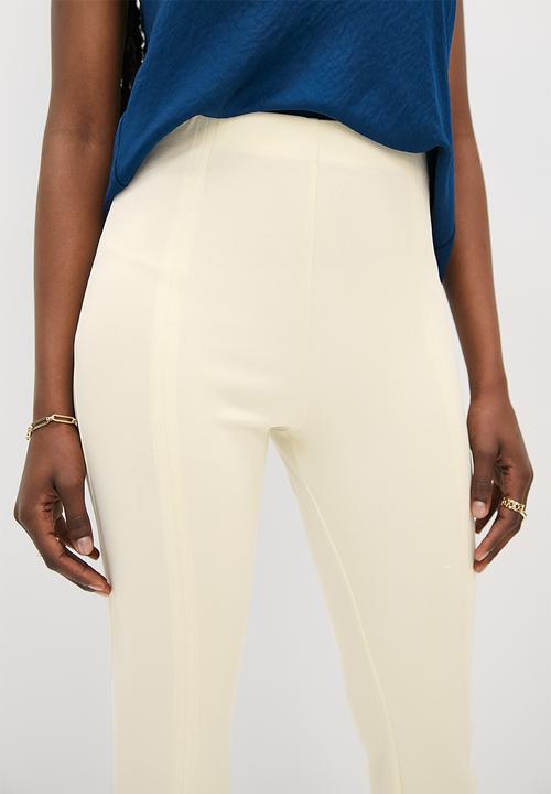 VELVET - Kickflare split hem ankle grazer pants - ecru