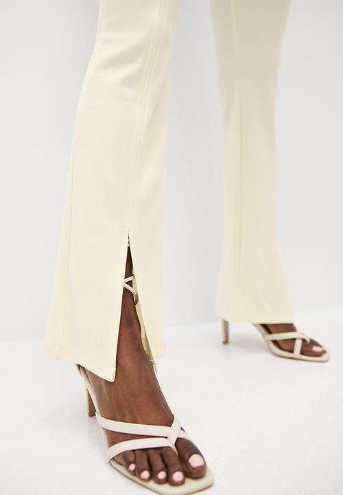 VELVET - Kickflare split hem ankle grazer pants - ecru