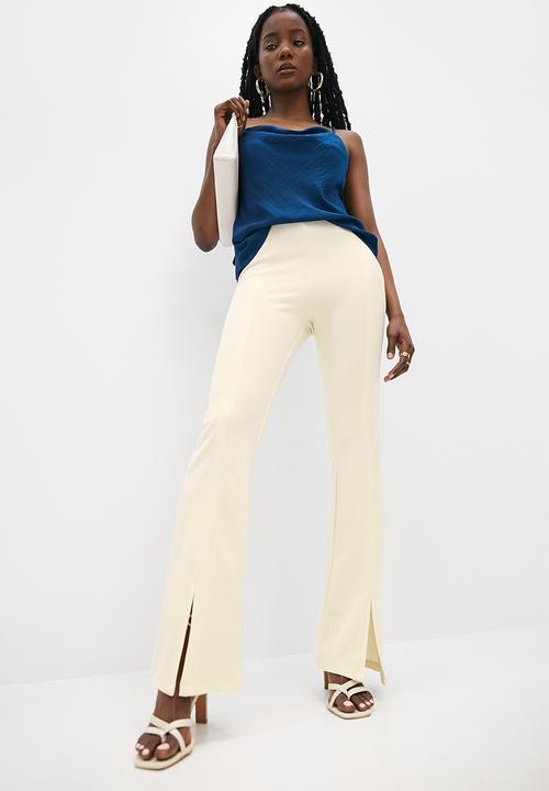 VELVET - Kickflare split hem ankle grazer pants - ecru