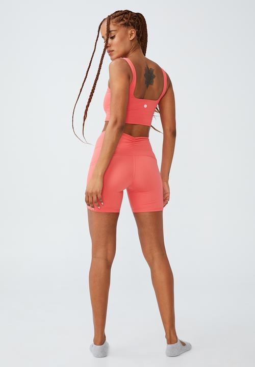Cotton On - Ultra soft booty lift pocket bike short - coral burst