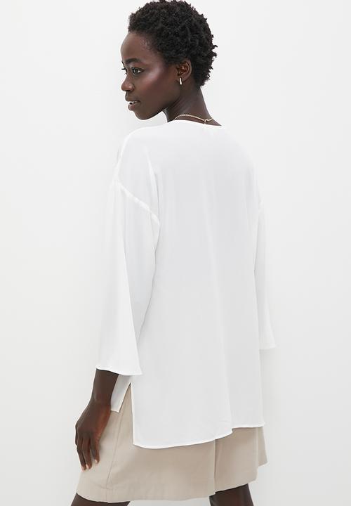 edit - V-neck hi low hem shell - milk