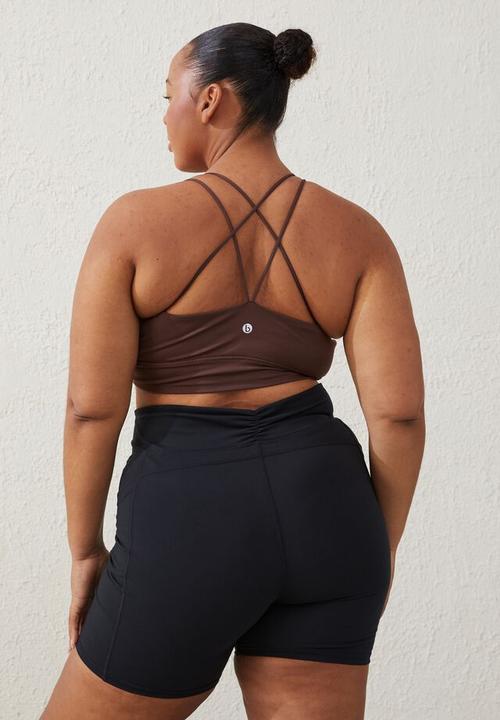 Cotton On - Curve active  recycled ruched strappy crop - cedar brown