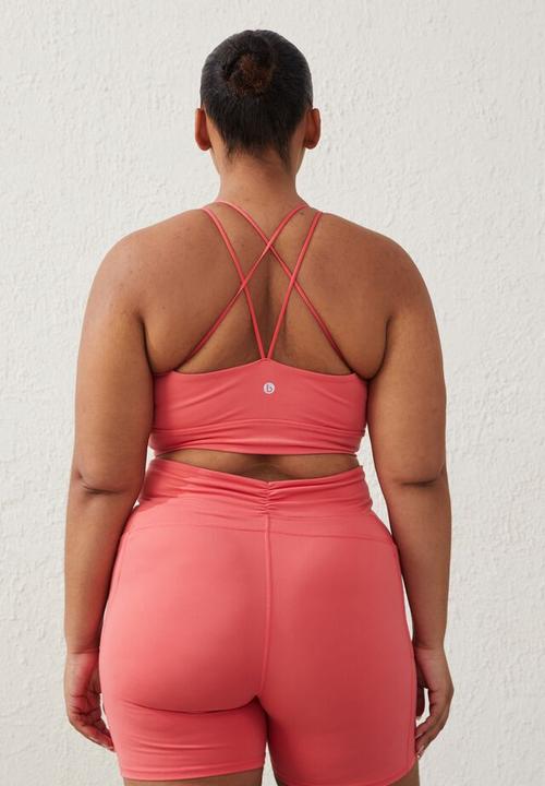 Cotton On - Curve active  recycled ruched strappy crop - coral burst