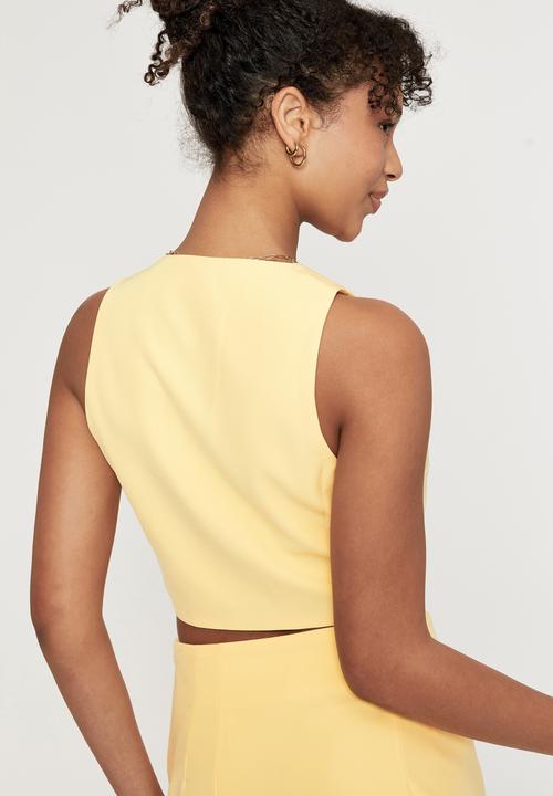 Supré  - Indigo sleeveless waistcoat - banana