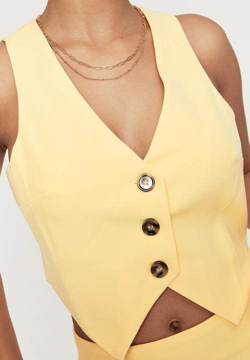Supré  - Indigo sleeveless waistcoat - banana