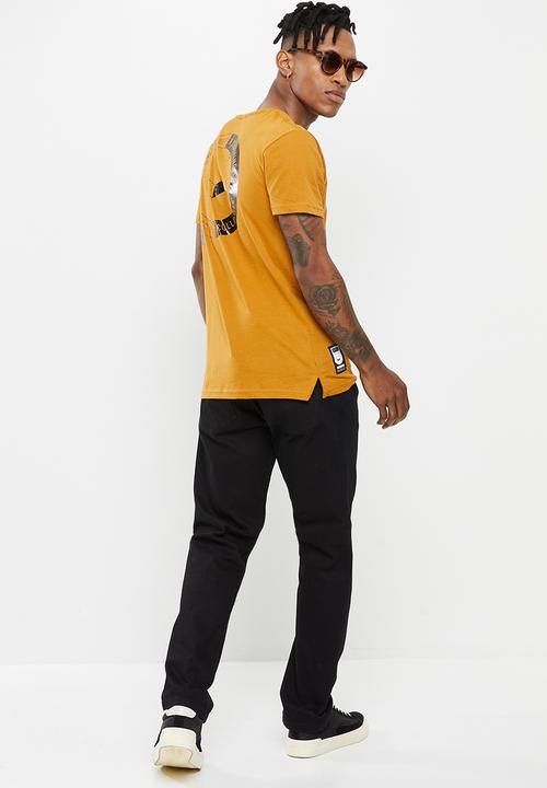 S.P.C.C - Fernandes tee - dark yellow