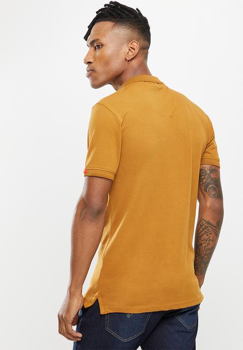 S.P.C.C - Diallo golfer - dark yellow