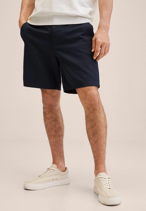 MANGO - Bermuda shorts . flek - blue