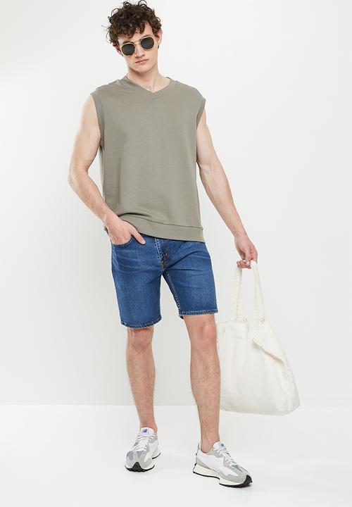 Levi’s® - 412 slim short - mid-blue
