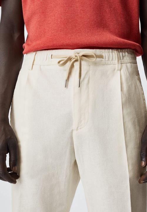MANGO - Flak trousers - cream
