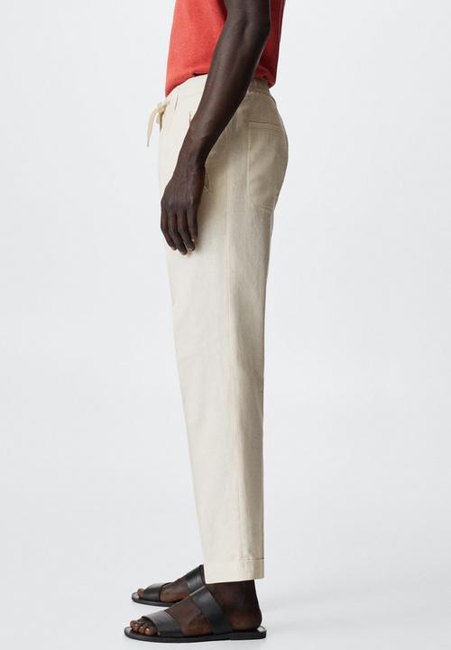 MANGO - Flak trousers - cream