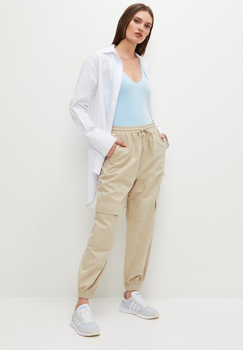 Superbalist - V-neck sleeveless bodysuit - skyway