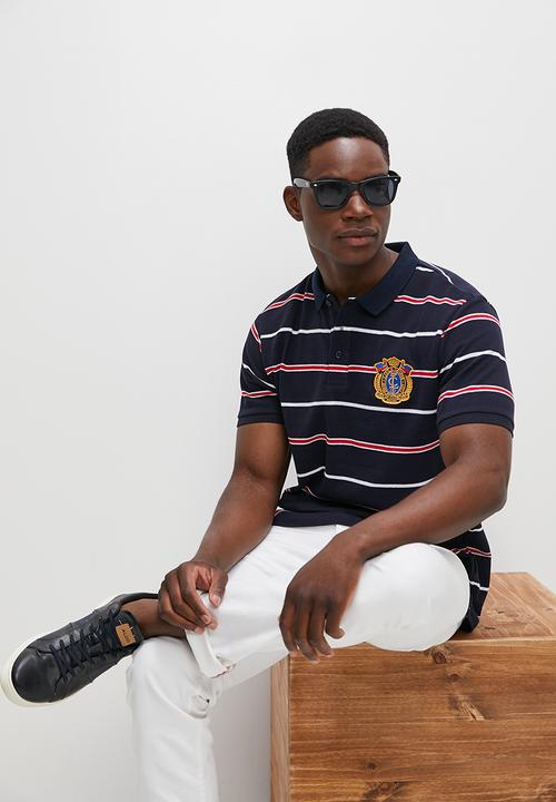 Lark & Crosse - Wide striped logo golfer navy & red