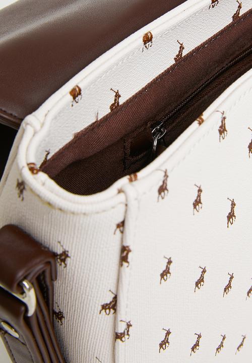 POLO - Chelsea flapover saddle crossbody bag - cream