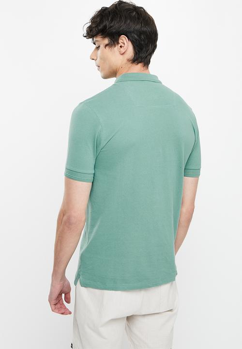 Vertigo - Vertigo running stitch embroidery golfer - mineral blue