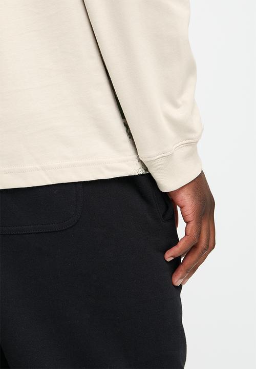New Balance  - Nb at graphic long sleeve - timberwolf