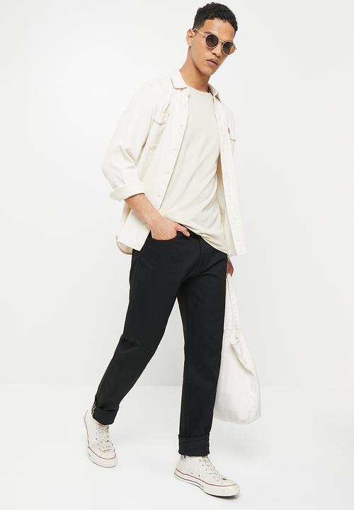THE UNBRANDED BRAND - Relaxed tapered fit 11 oz solid black stretch selvedge denim