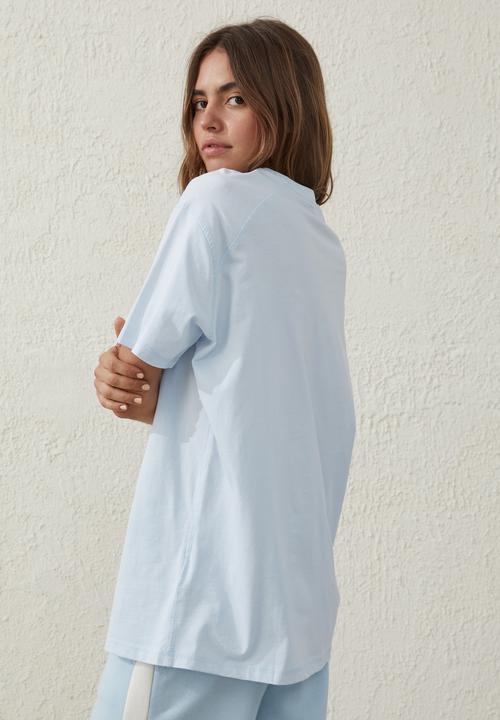 Cotton On - Active graphic T-shirt - silky blue/bhwc runners
