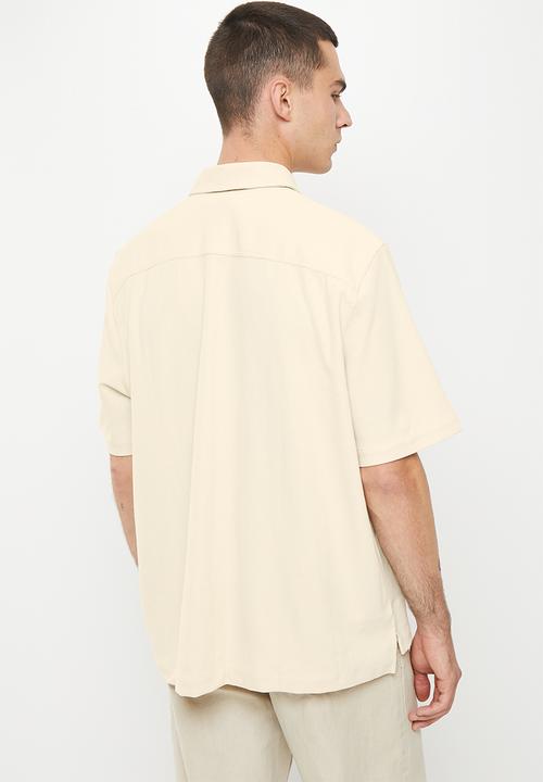 Calvin Klein - Institutional knitted short sleeve shirt - eggshell