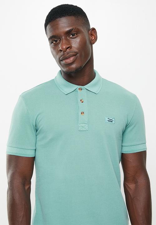 Vertigo - Vertigo badge embroidery pigment dyed  golfer - mineral blue