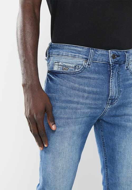 GUESS - An1monty super skinny - mid wash